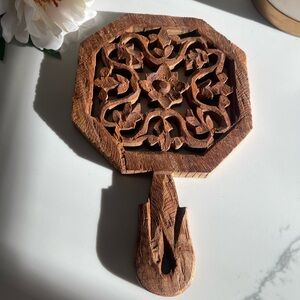 vintage hand-carved wooden trivet